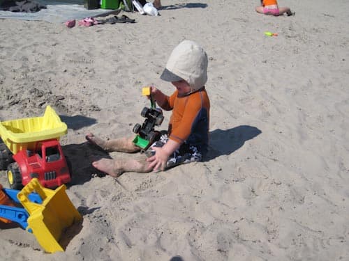 Playing with trucks on the beach at Presquile Provincial Park